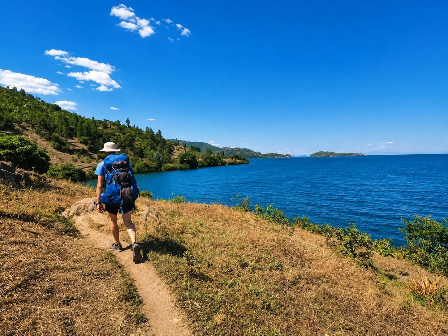 A tourist taking a hike alongside the Congo Nile Trail