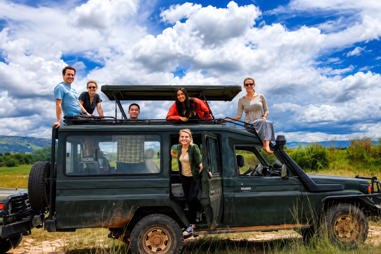 Friends Posing Inside A Rwandan National Park